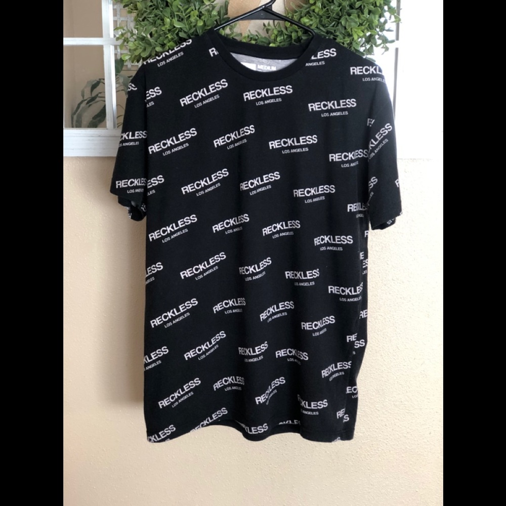 Black t-shirt, a bit faded